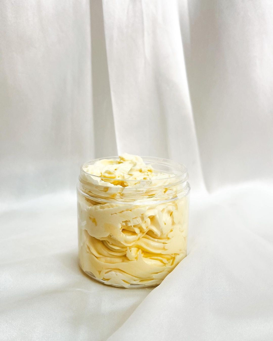 Butterbloom hair growth scalp stimulator balm jar with natural ingredients for thinning hair and scalp nourishment.