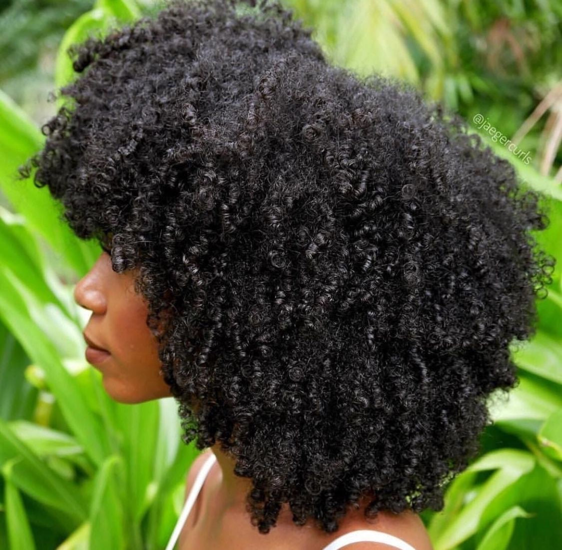 Herbal and oil deep hair mask in 8oz jar by Butterbloom, showcasing the natural product with a focus on hair care ingredients.