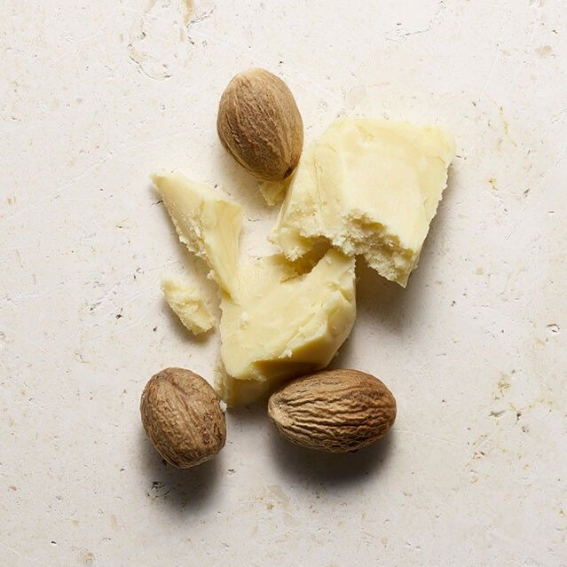 Butterbloom hair growth scalp stimulator balm applied to scalp, showing the product's nourishing formula for thicker, healthier hair.