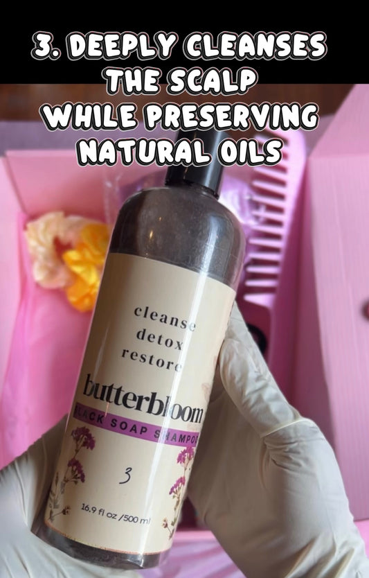 Butterbloom African black soap shampoo bottle, designed for promoting hair growth, set against a neutral background.