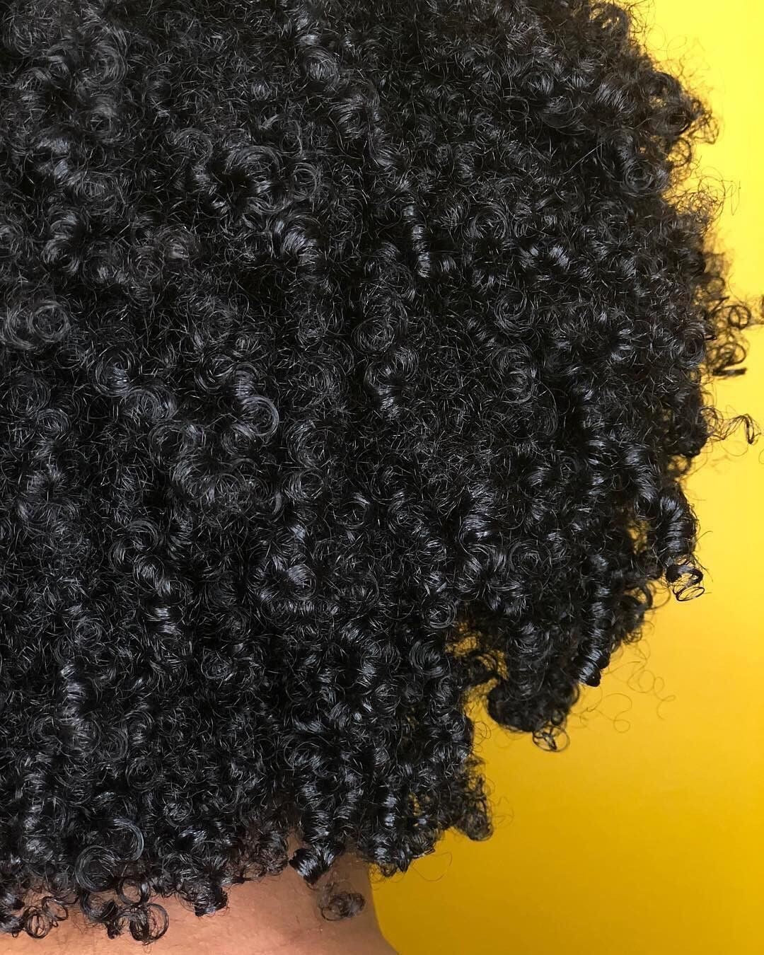 Butterbloom deep herbal hair and oil mask in 8oz jar, rich in natural ingredients for nourishing and conditioning hair.